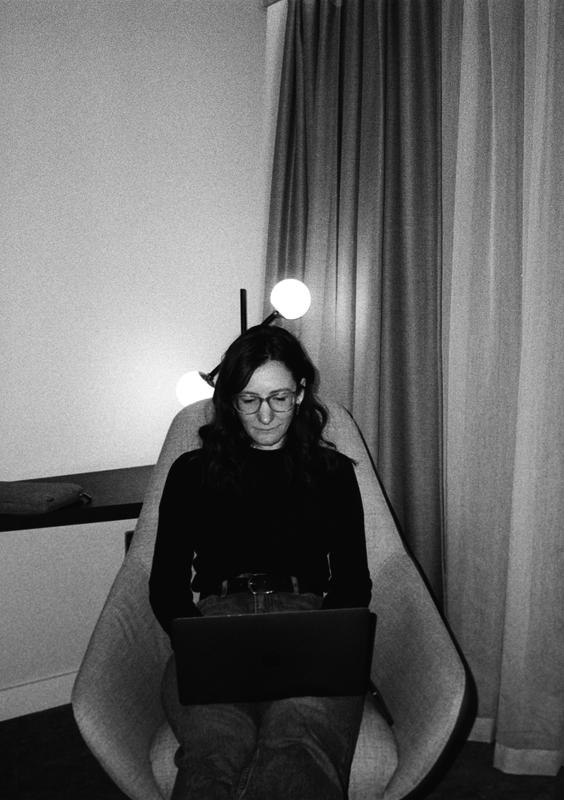 A woman on a laptop.