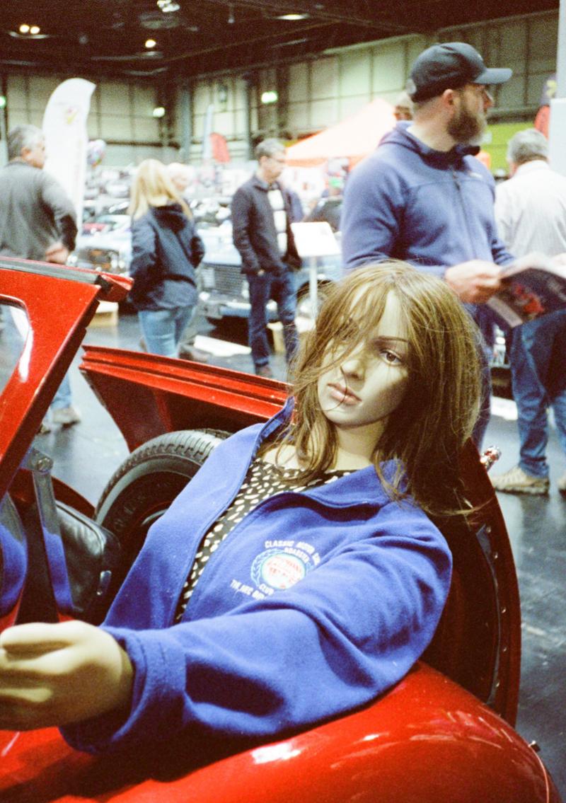 A Mannequin in a car