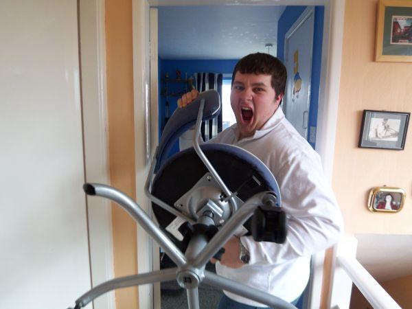 A guy with a chair