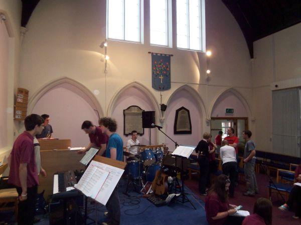 A choir setting up