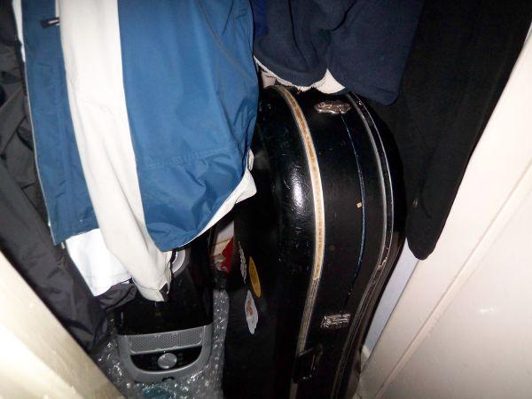 A tuba in a cuboard