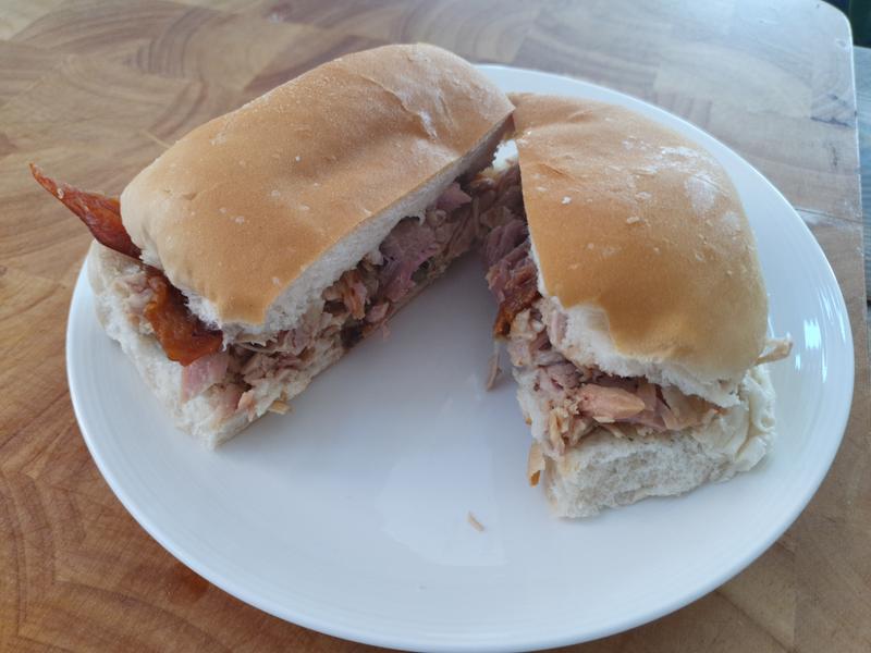 The inside of a roast pork sandwich